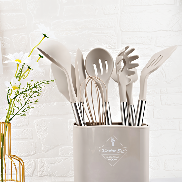 Food-grade silicone cooking utensils with robust stainless steel handles, a must-have kitchen set.