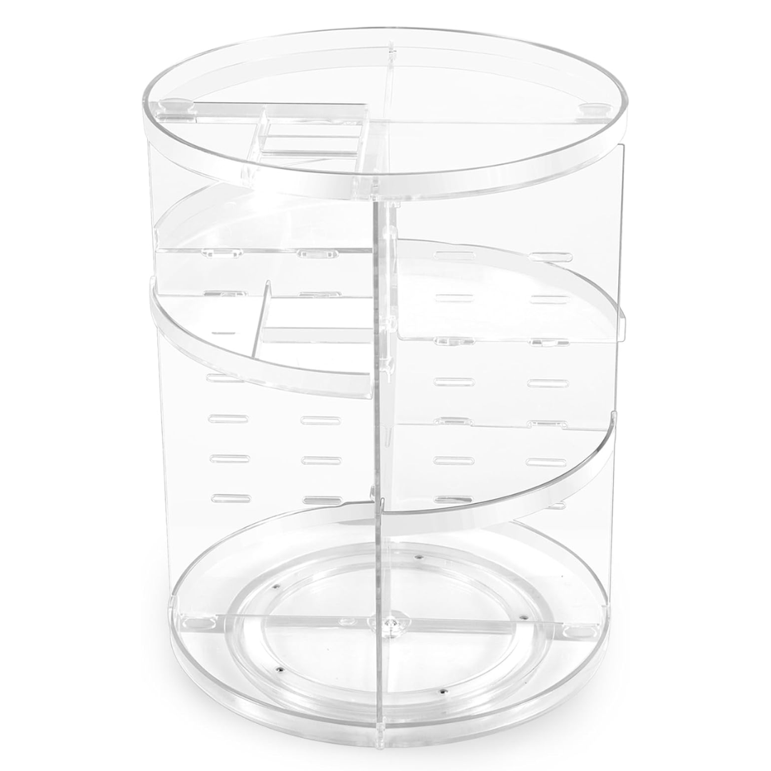 Rotating makeup organizer displaying skincare products, brushes, and cosmetics on a table