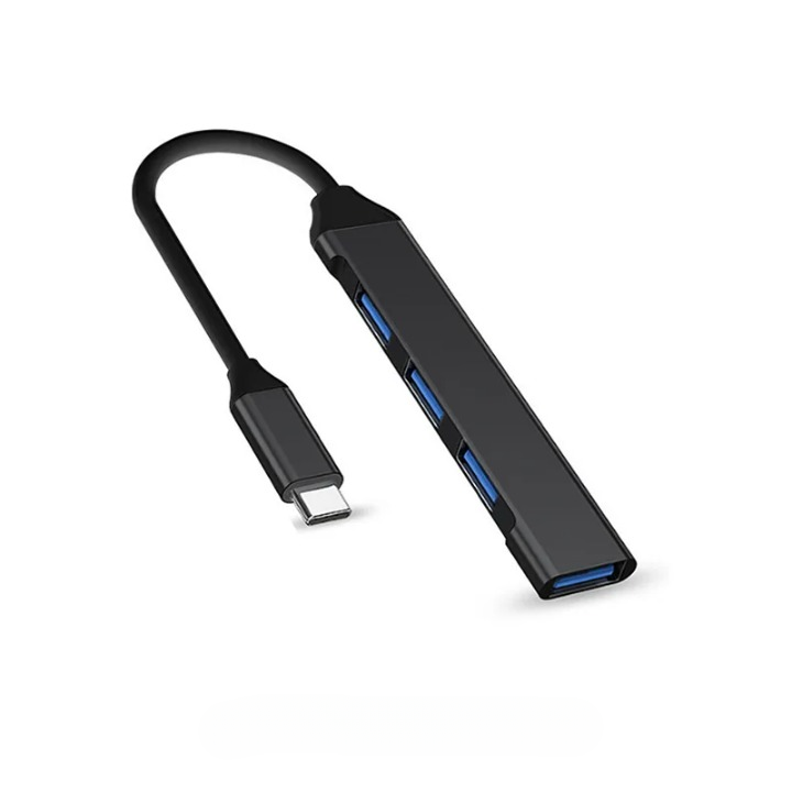 High-speed 4-Port USB splitter in use, connecting multiple USB devices to a PC