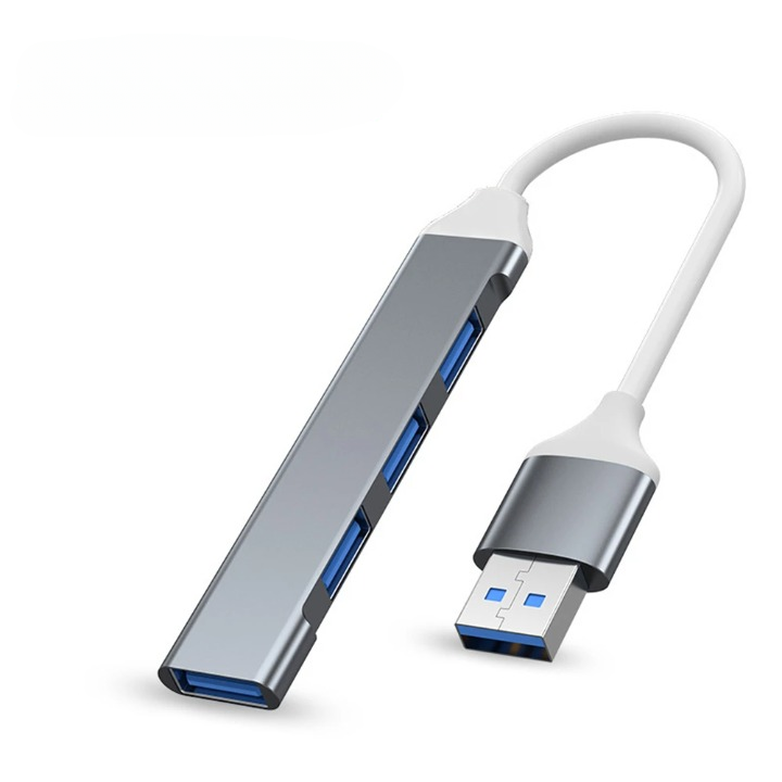 Ergonomic 4-Port USB hub, desktop view with keyboard and mouse, organized workspace