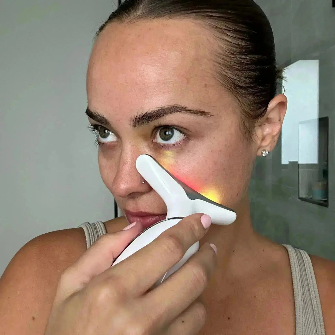 Compact LED facial massager for portable firming, anti-aging, and toning treatments.