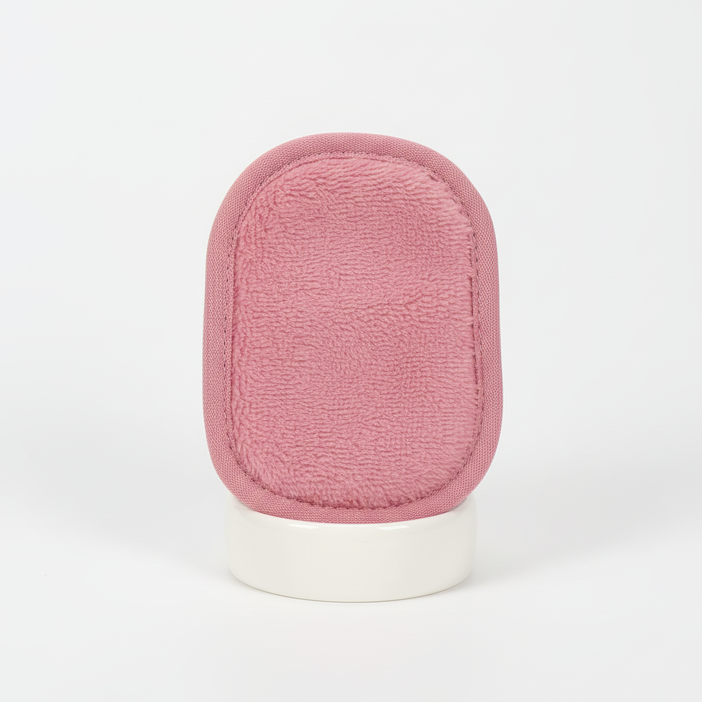 Close-up of a soft microfiber reusable cleansing pad, ideal for fragrance-free facial cleansing