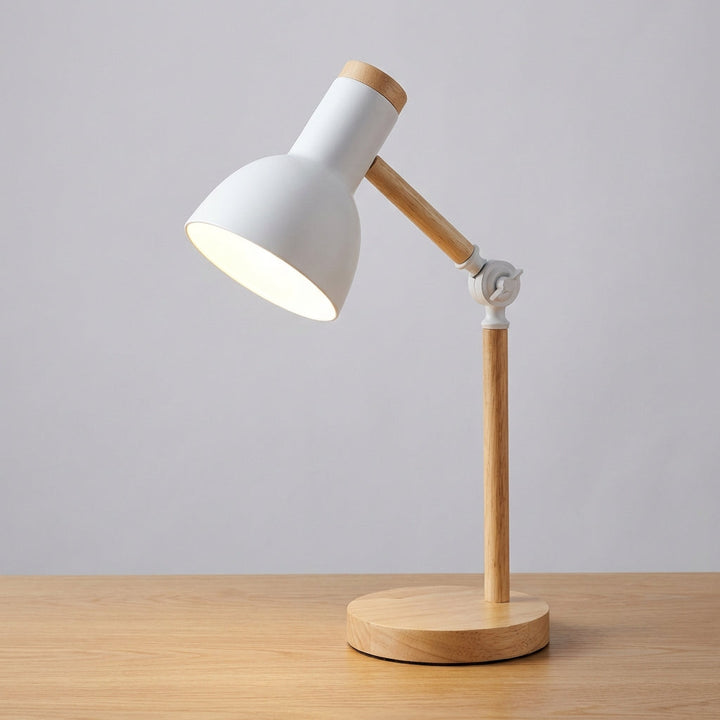 Minimalist black adjustable desk lamp by Arclume, Nordic design, perfect for focused task lighting on a table