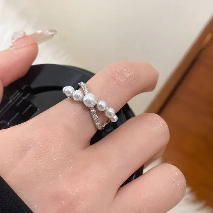 Retro-inspired adjustable ring for women, combining vintage style with a radiant pearl & glittering zirconia.
