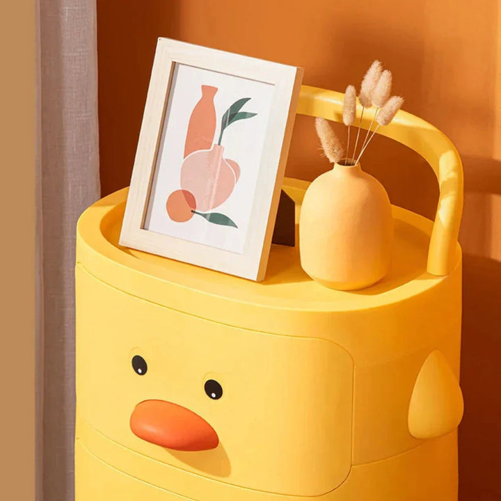 Plastic toy storage rack trolley with a cheerful duck theme, enhancing any kids' room decor and organization.