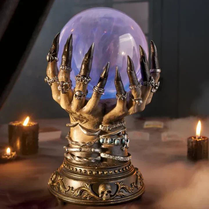 Close-up of Aetherclaw gothic lamp, showing intricate skeletal hand design and vibrant plasma light effect.