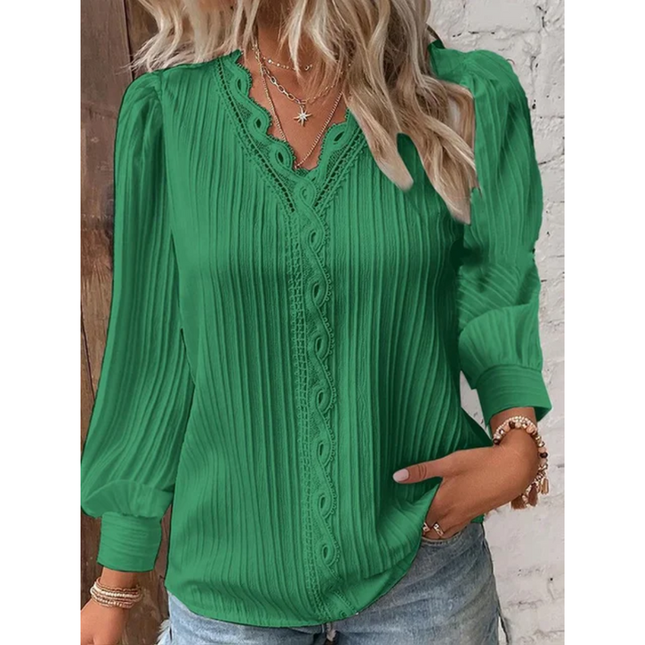 Chic Alvara women's blouse with V-neck, long sleeves, and stylish button cuffs. Ideal for versatile fashion.