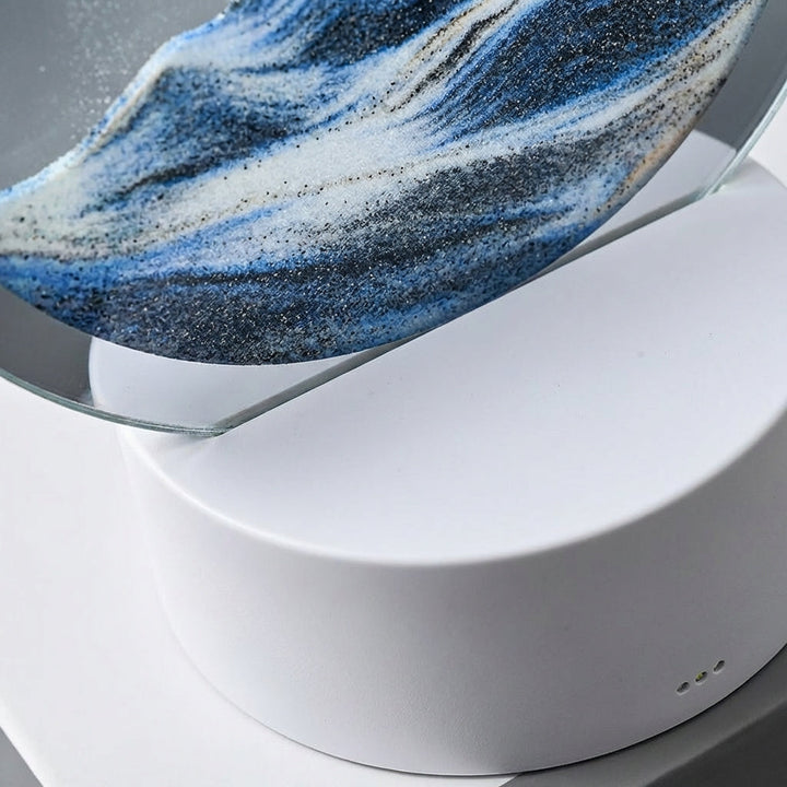 Decorative AquaDrift sand art lamp with a round frame, showcasing tranquil sand patterns and soft LED illumination.