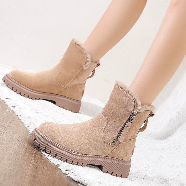 Warm, waterproof Aria women's winter boots with slip-resistant soles for ultimate cold-weather comfort.