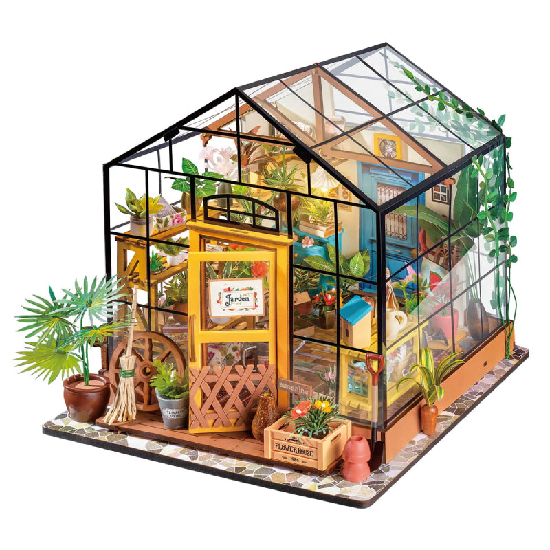 Assembled miniature wooden garden house. Detailed DIY kit for home decor & creative model building.