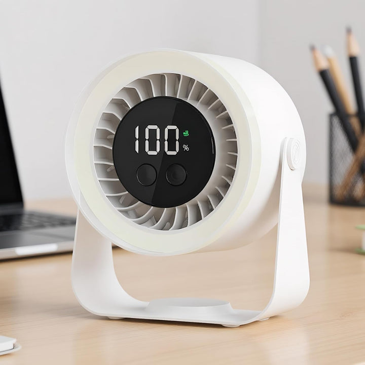 White Auralis USB Rechargeable Desk Fan, demonstrating its quiet operation in a library setting.
