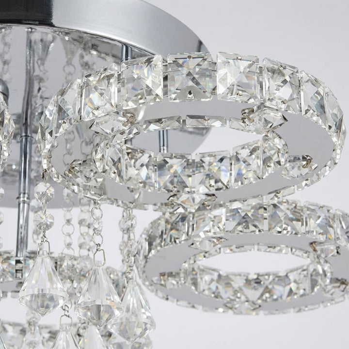 Elegant Aurellin crystal chandelier illuminating a room, modern LED lighting adds luxurious ambiance to home