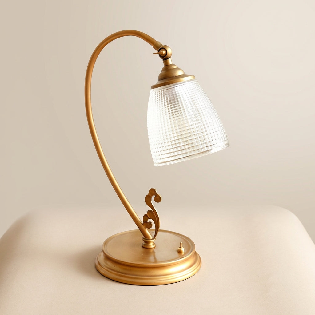Close-up of Aurelyne Vintage Inspired Table Lamp, showcasing distressed gold finish and classic design