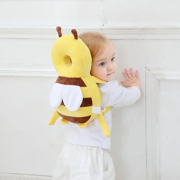 Baby fall prevention head cushion with cute little bee design, offering soft head protection for infants and toddlers.