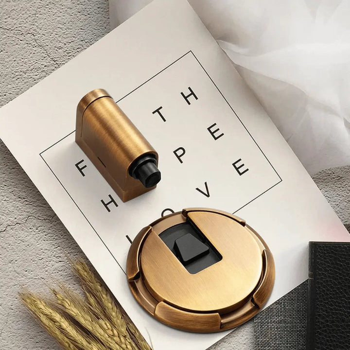 Stylish black magnetic door stop, easy no-drill adhesive mount for silent, secure door hold & wall protection.