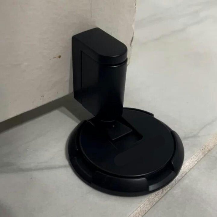 Bronze drill-free magnetic door stopper for home safety, protects walls, and holds doors open effortlessly.