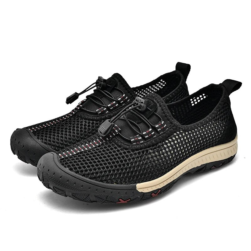 Black men's breathable slip-on loafers for summer. Lightweight & comfortable casual footwear, ideal for daily wear or travel.