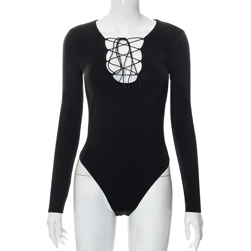 Versatile women's black lacing bodysuit. Features a deep V-neck & long sleeves. Trendy fitted fashion for daring looks.
