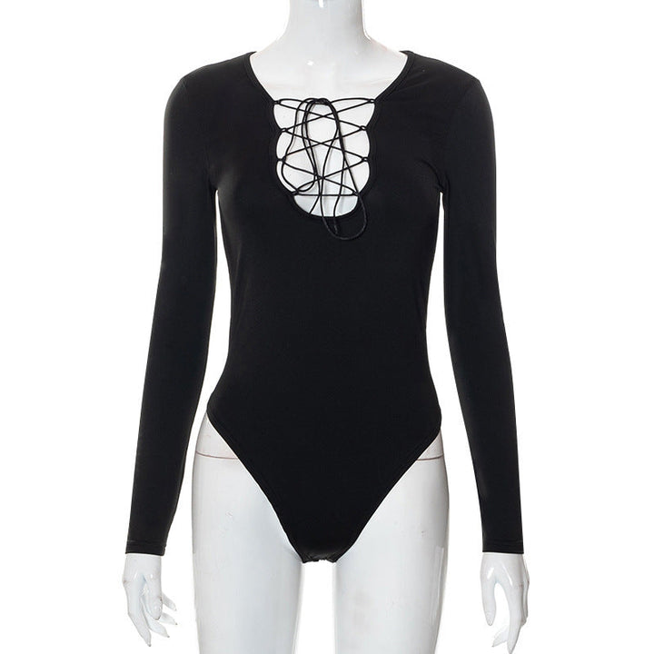 Versatile women's black lacing bodysuit. Features a deep V-neck & long sleeves. Trendy fitted fashion for daring looks.