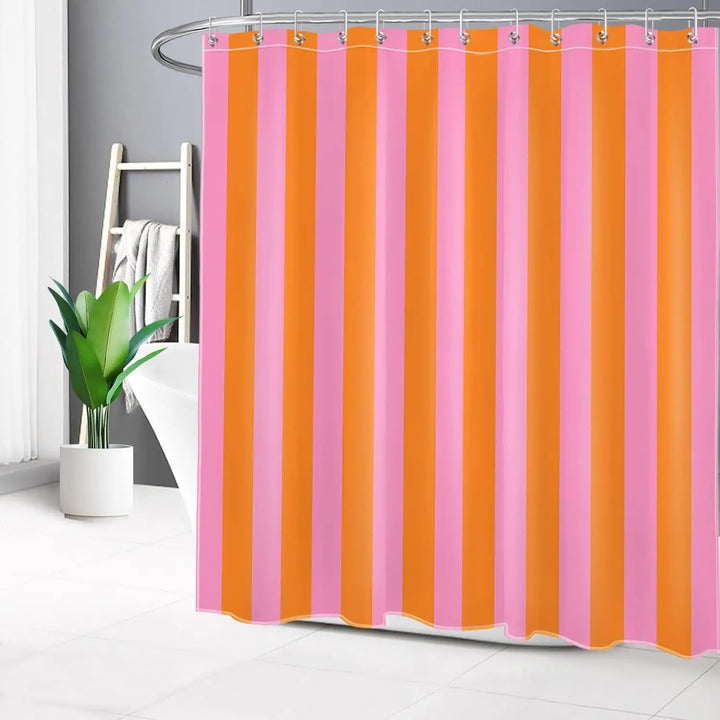 Detail of the upper grommets on a boho striped fabric shower curtain, indicating easy installation
