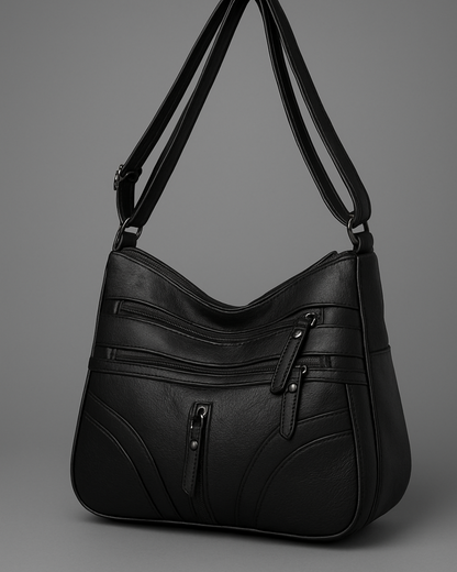 Bolso de mujer bandolera negro con cremalleras, organizador interno, estilo casual