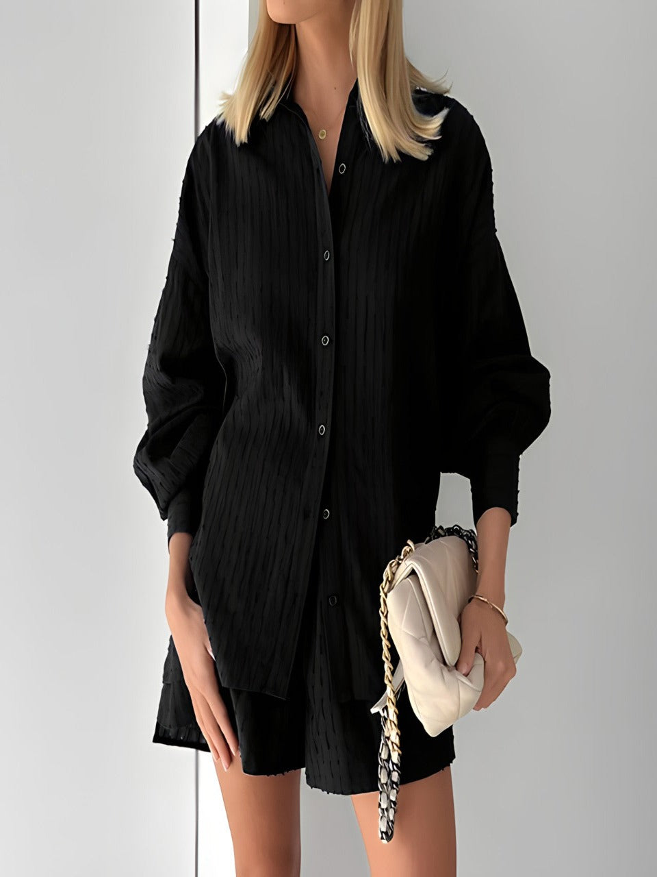 Women's casual summer blouse and shorts two-piece set, perfect for breezy vacation loungewear.