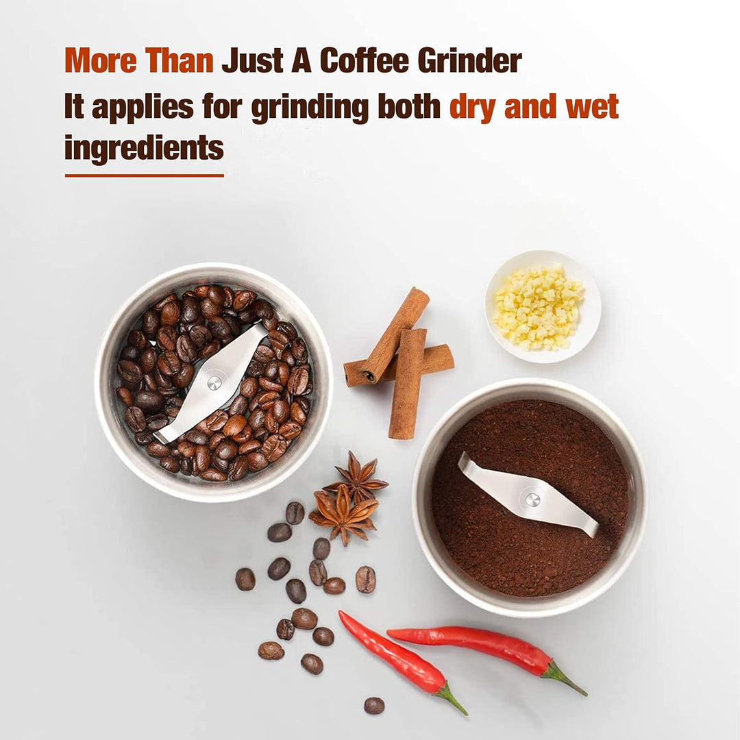 Side view of modern BrewMate electric grinder, compact design, with 'on' button clearly visible, kitchen tool