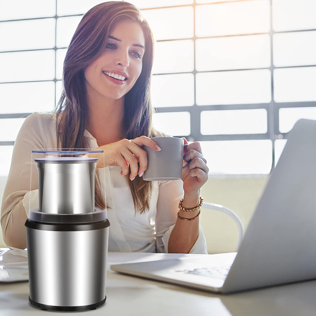 BrewMate electric coffee grinder with cup removed, showing interior for cleaning, food prep
