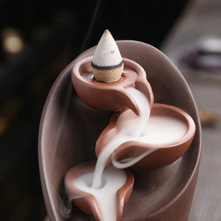 Stress relief aromatherapy incense waterfall burner, ideal for yoga & calming home environments.