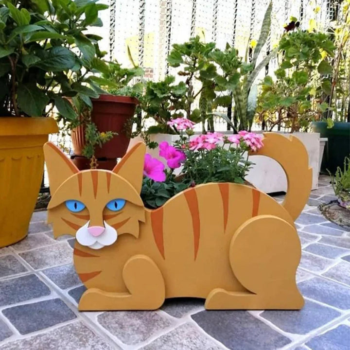 White plastic cat planter, a whimsical animal plant pot for backyard gardens.