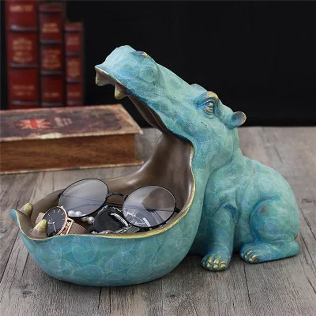 Cute hippo desk organizer, an animal figurine storage solution for a tidy and fun workspace.
