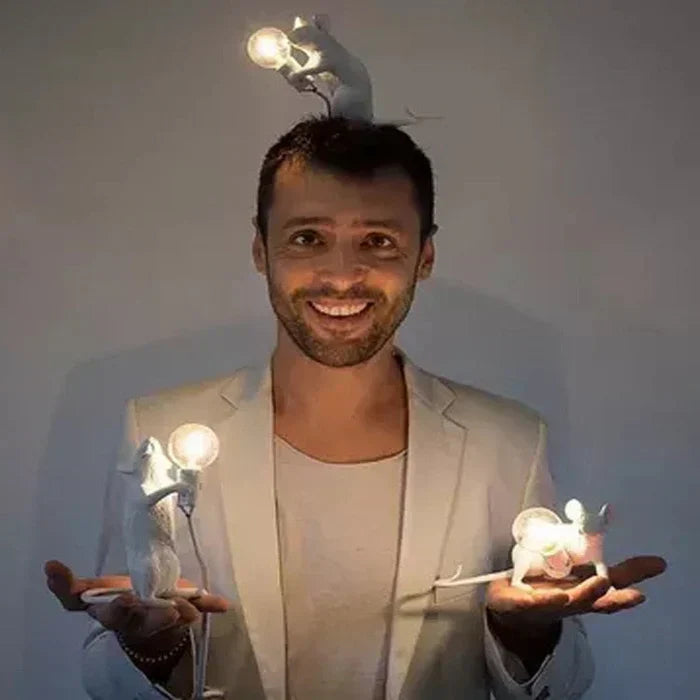 Playful white resin mouse LED table lamp, perfect for adding whimsy to kids room or as a gift.