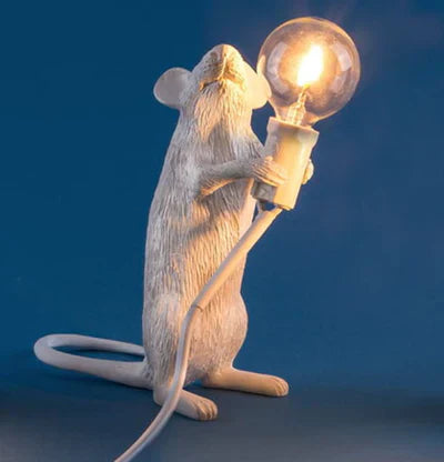 Stylish gold resin mouse LED table lamp, a fun and functional piece of novelty lighting home decor.