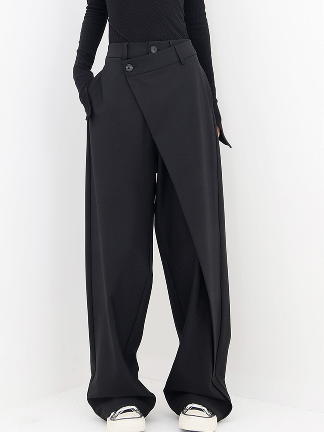 Contemporary women's baggy pants, asymmetrical and stylish, with a comfortable low-waist design.