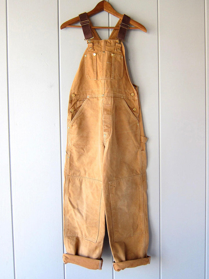 Chic women's Eliza jumpsuit overall. Versatile, comfortable one-piece in brown, green, black for elegant fashion.
