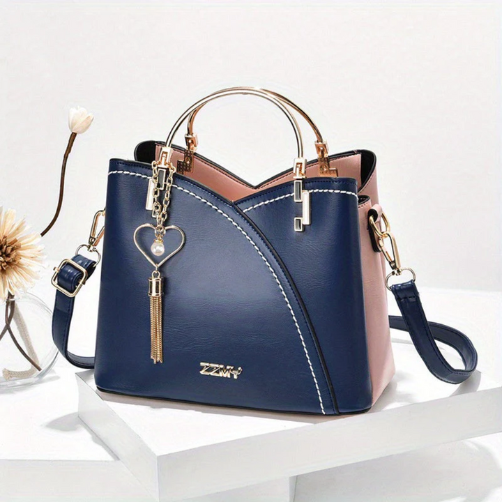 Spacious women's shoulder bag. Elegant faux leather versatile everyday handbag.