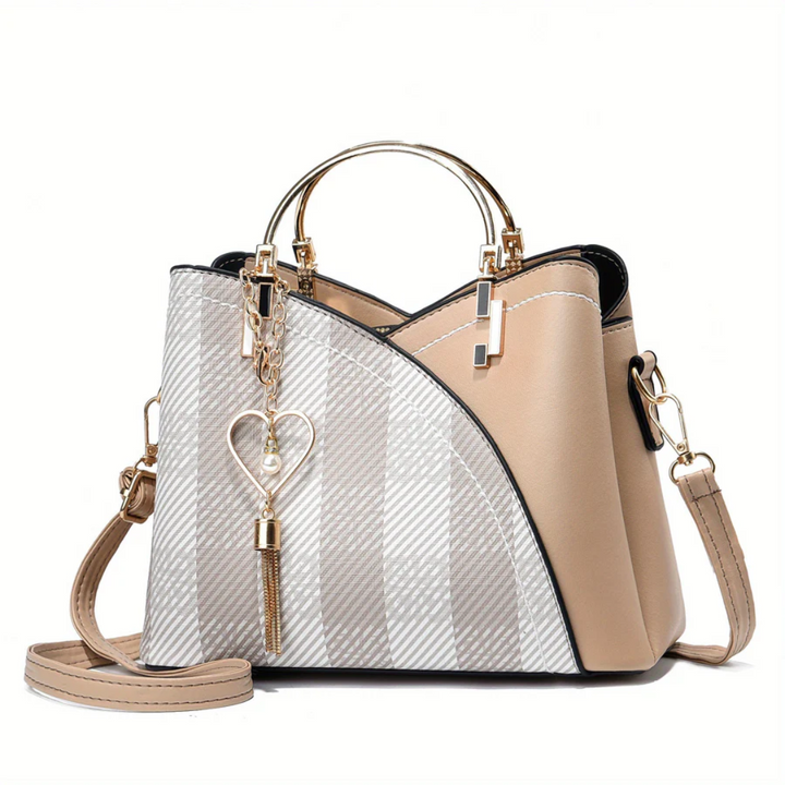Convertible women's shoulder bag. Elegant faux leather versatile everyday handbag.