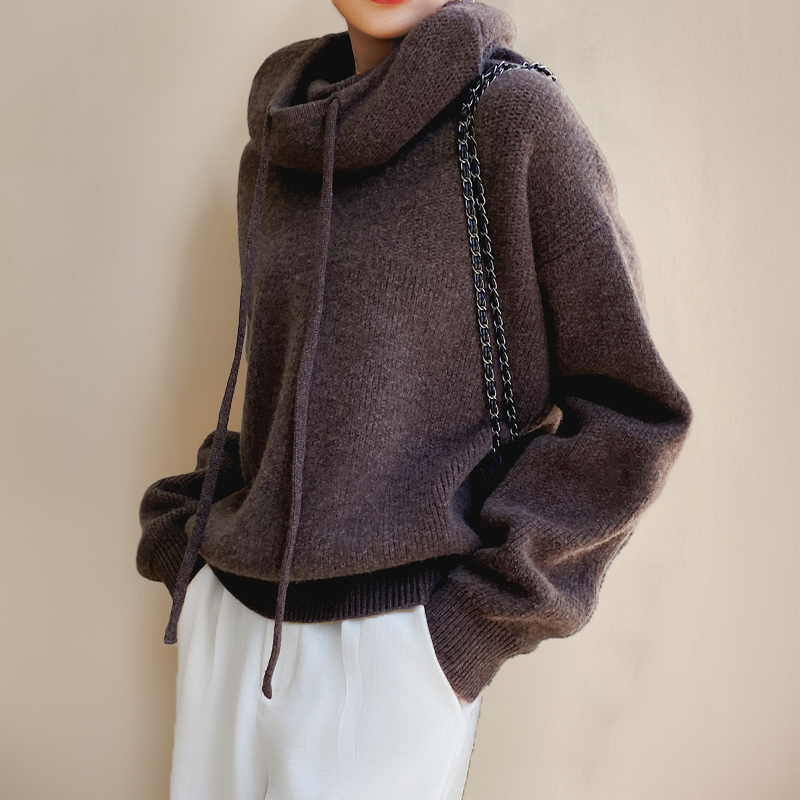 Soft Merino wool women's high-neck sweater, designed for maximum warmth and cozy comfort in winter.
