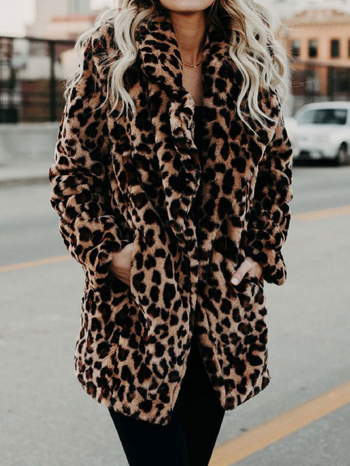 Chic women's leopard print winter coat, a stylish outerwear piece for cold weather fashion.