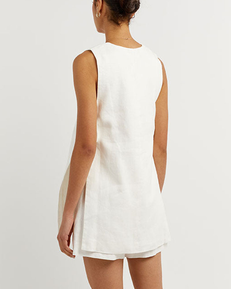 Trendy women's sleeveless gilet. Stylish casual wear top from a high-waisted shorts set, ideal for summer.