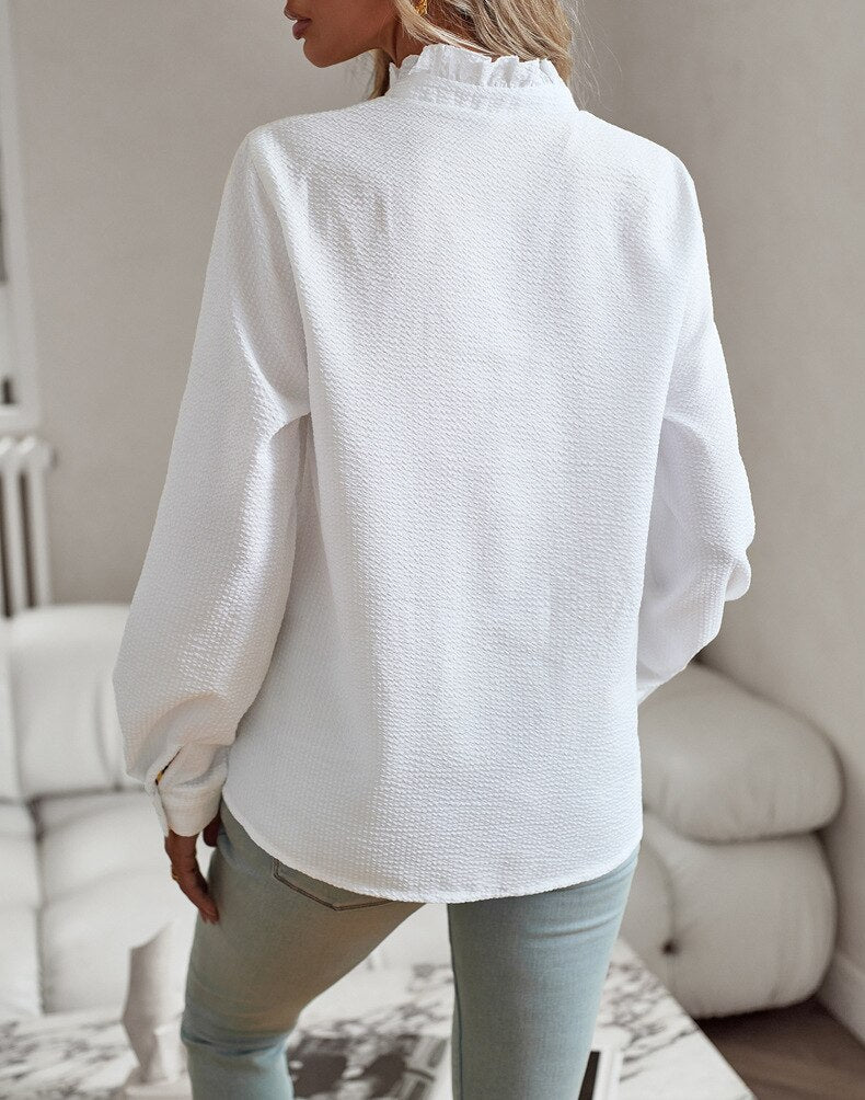 Women's long sleeve striped blouse. Elegant and comfortable for any occasion.