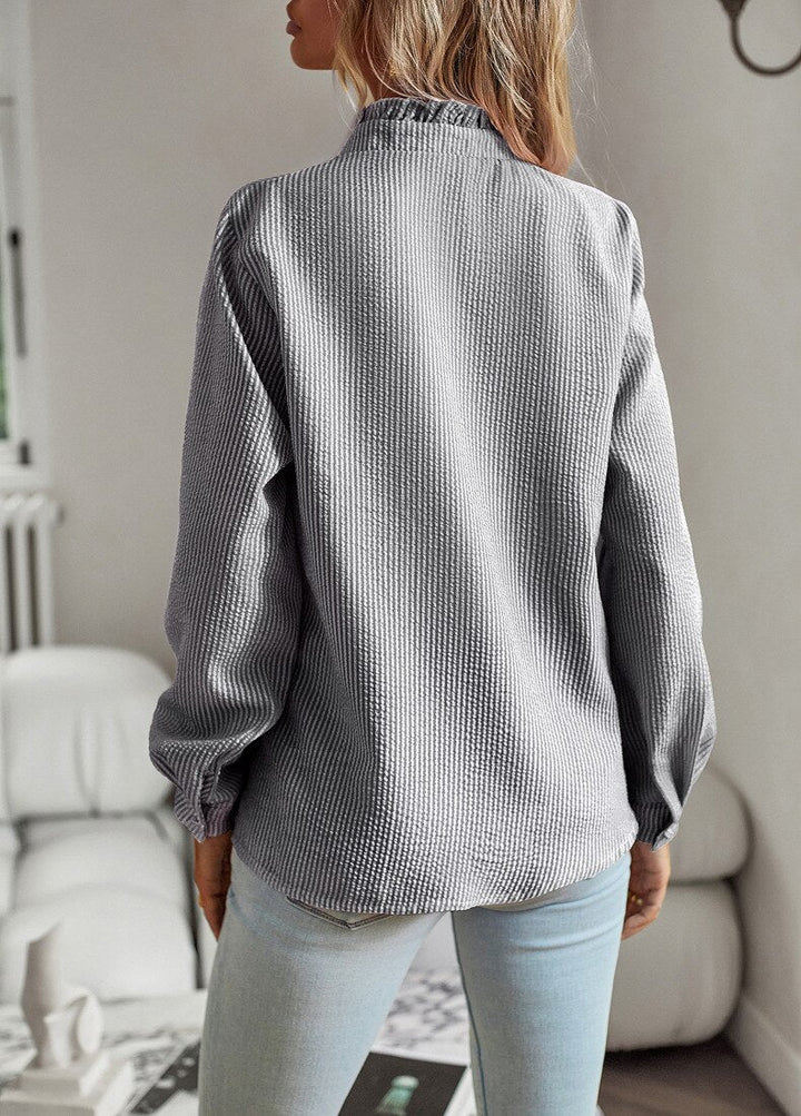 Trendy women's striped shirt. Effortless comfort & stylish long sleeve design.