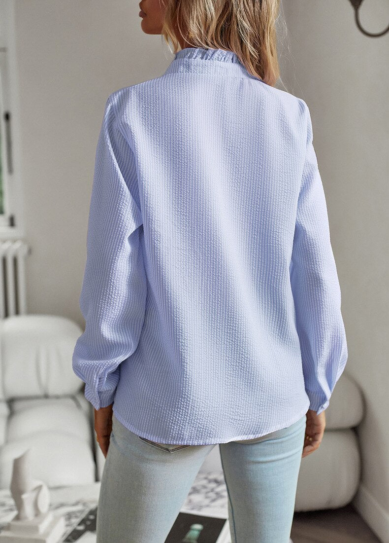 Women's casual striped blouse. Comfortable long sleeve shirt for everyday fashion.