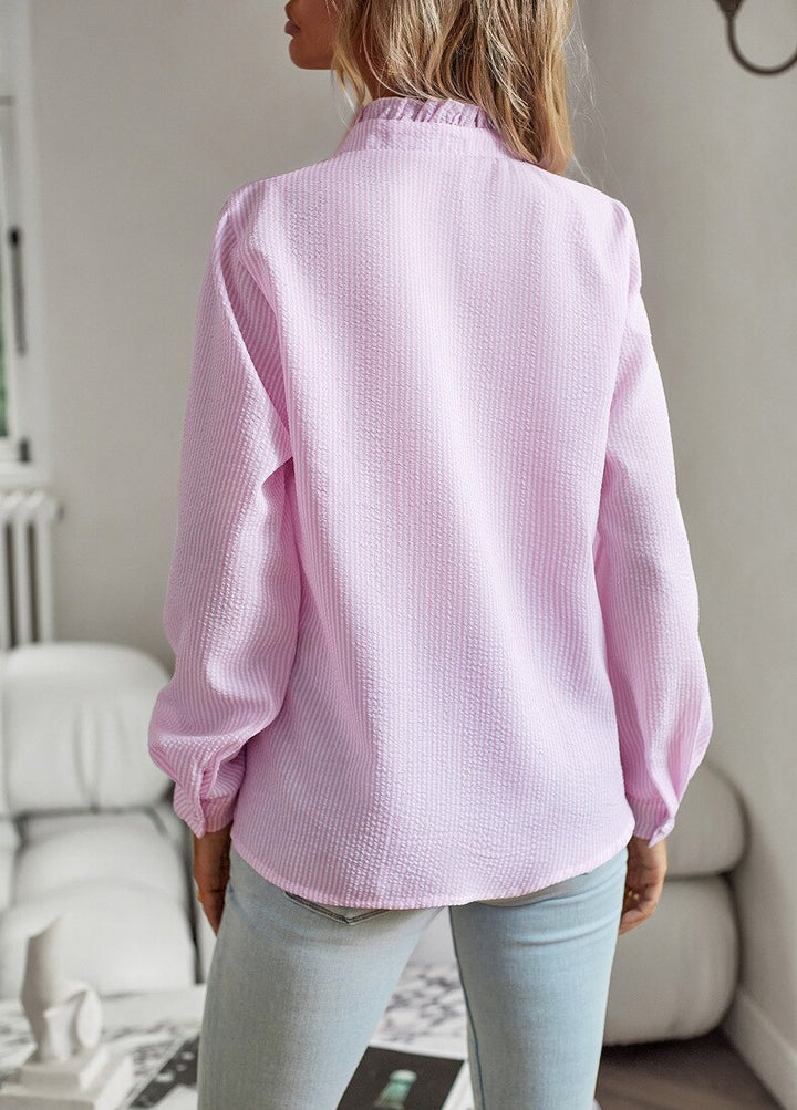 Versatile striped women's blouse. Long sleeve and comfortable for office or casual looks.