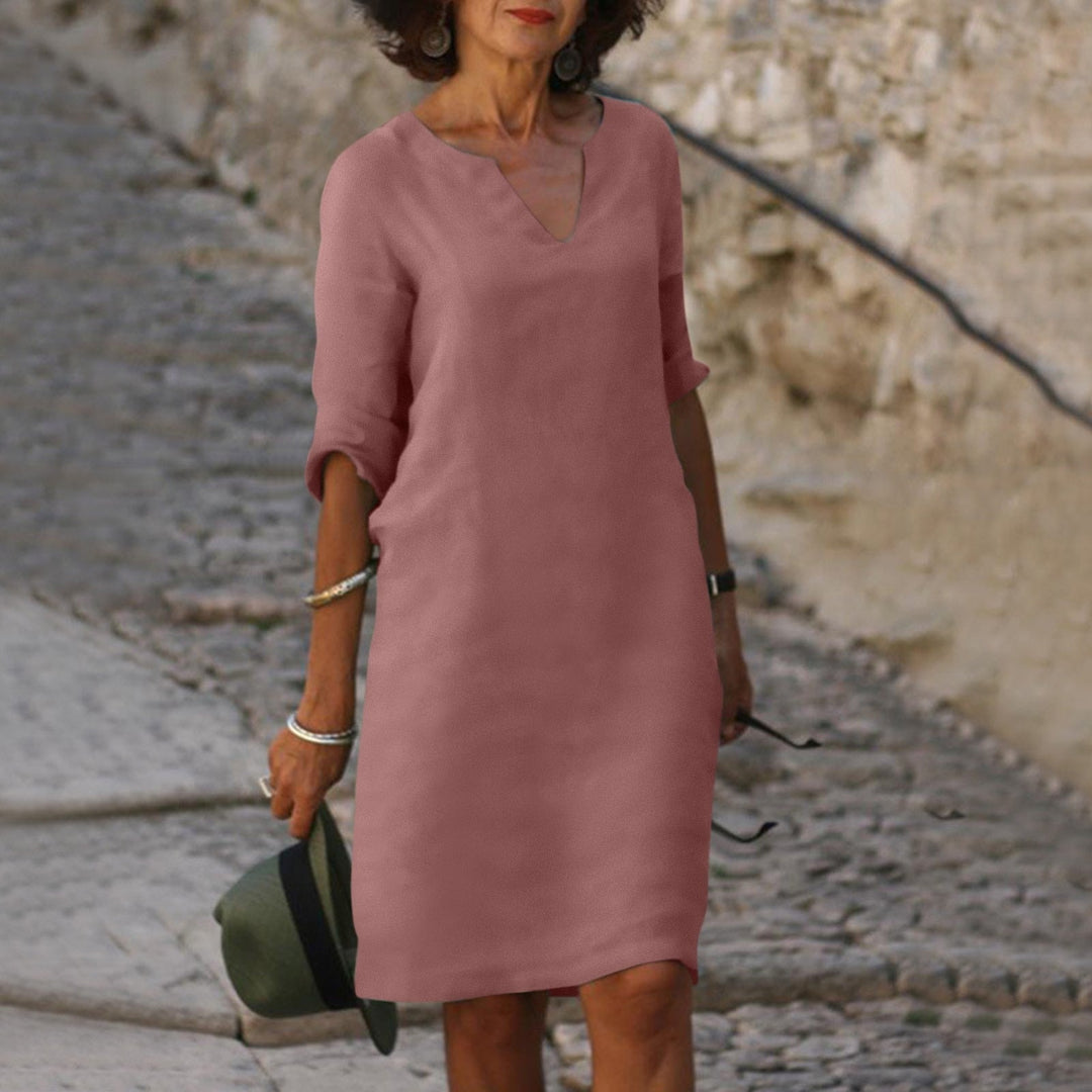 Flattering women's short sleeve maxi dress, designed for chic comfort and effortless summer style.