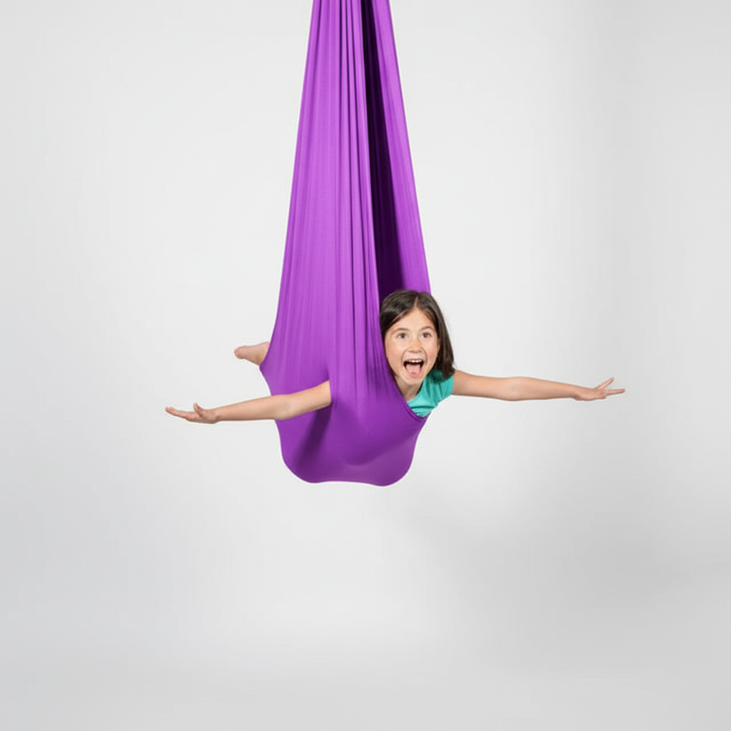 Sensory swing for kids care, shown in a playroom, providing a safe space for focus and relaxation.