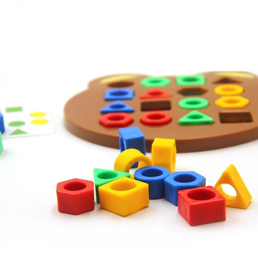 Toddler's educational shape & color puzzle. A Montessori toy fostering fine motor skills, shape recognition, & matching.