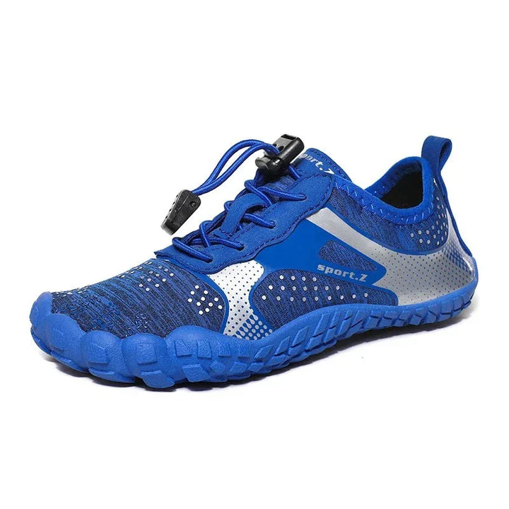 Kids WaveTrek water shoes with durable, protective sole for beach & outdoor summer play. Secure fit footwear.