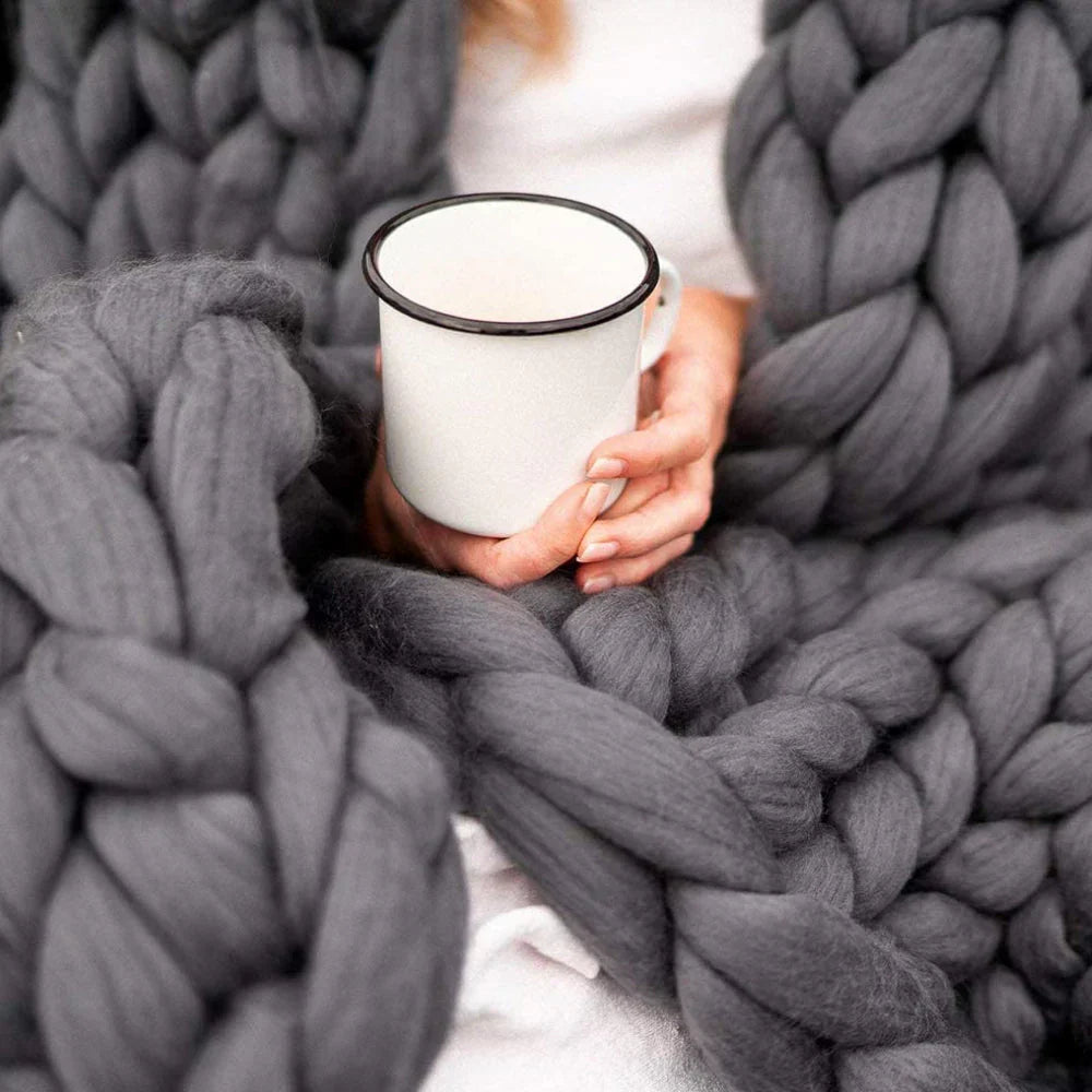 Extra large chunky wool yarn for creating warm, decorative blankets.