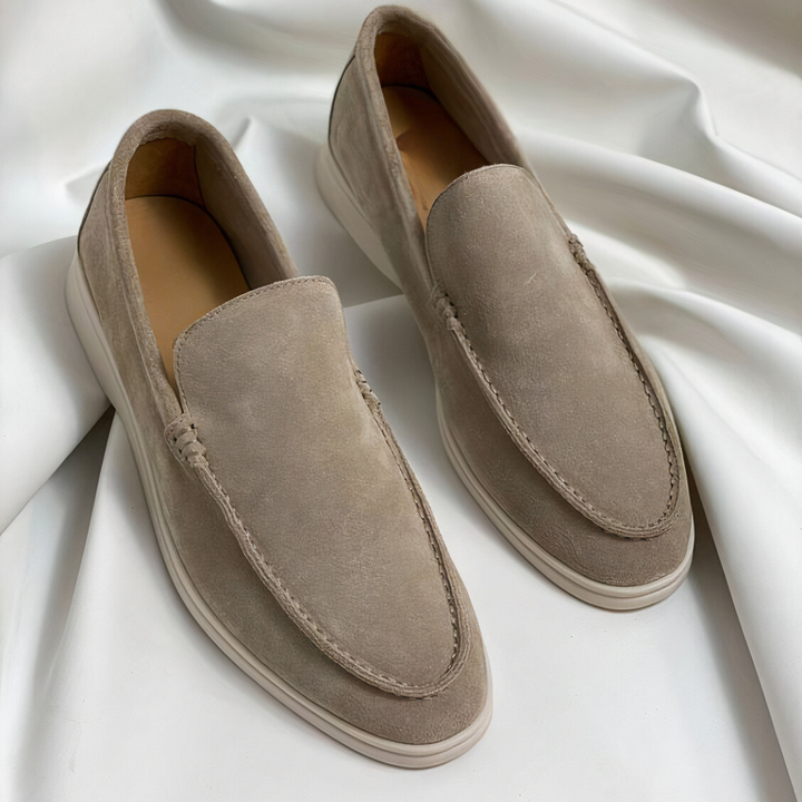 Men's elegant brown leather slip-on loafers, offering classic style, comfort, and versatile everyday wear.